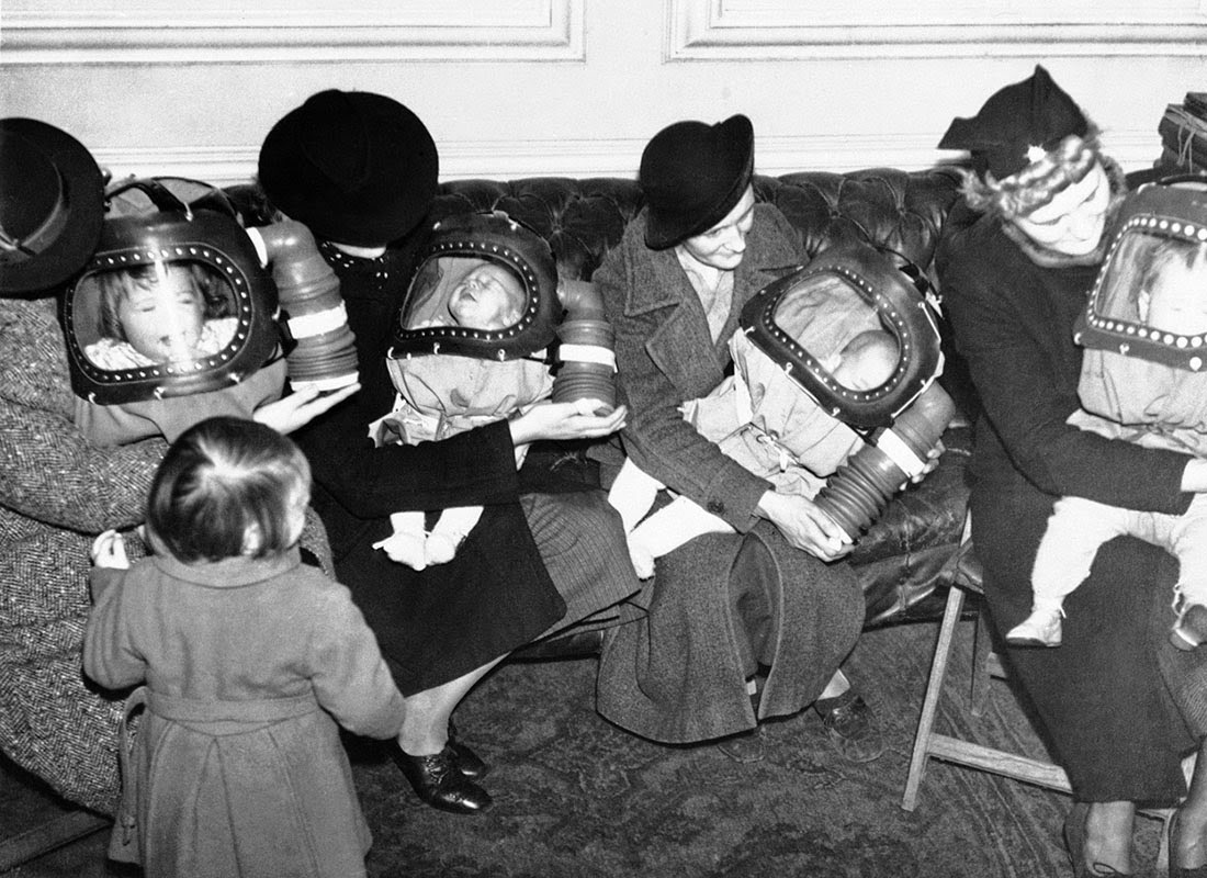 Mothers outfitting their children with "baby helmets".