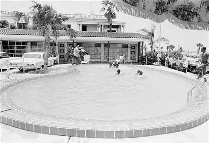 Motel manager pouring acid in the water when black people swam in his pool