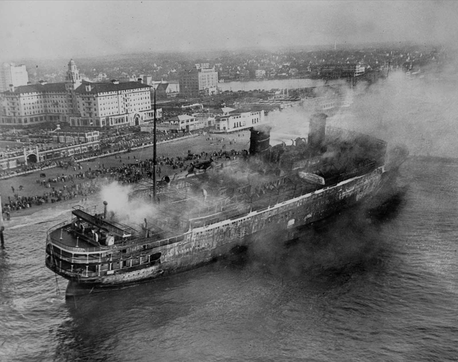 The ship comes to rest on the beach at Asbury Park, New Jersey.