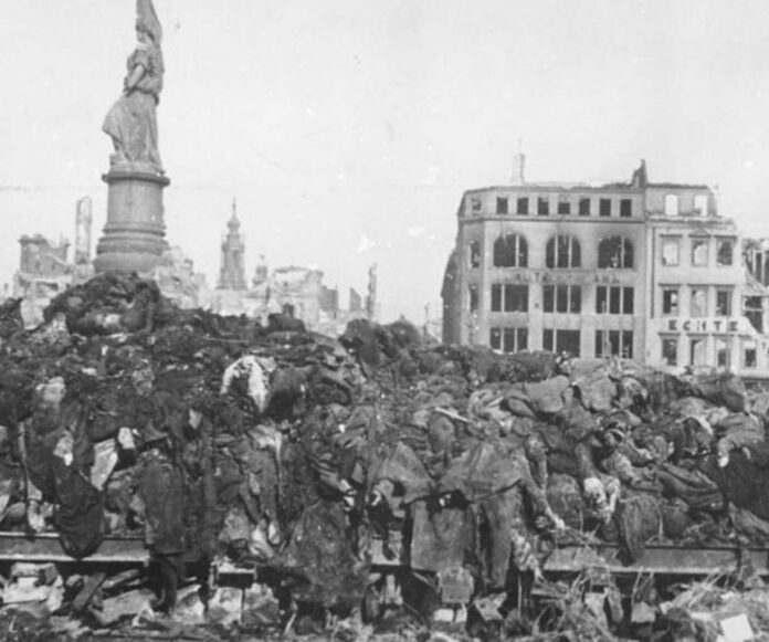 A pile of bodies awaits cremation after the bombing of Dresden, 1945
