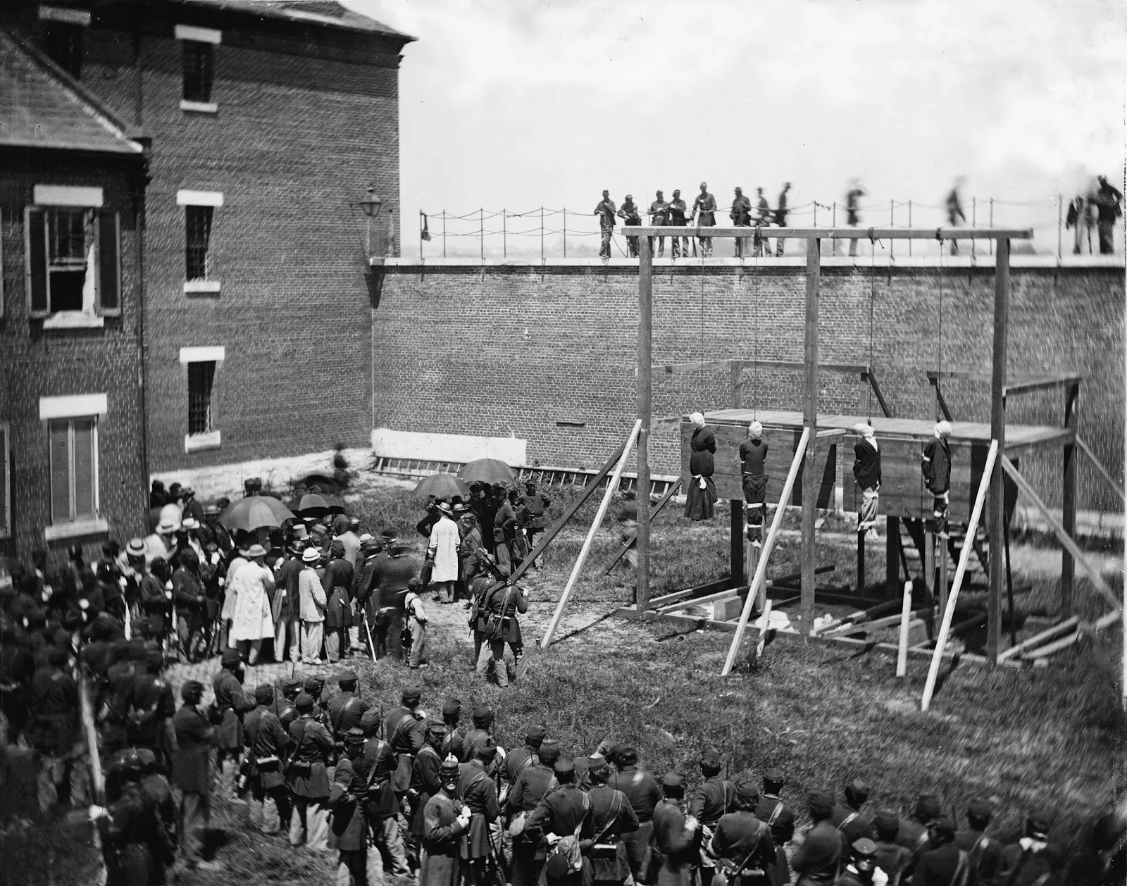The conspirators stood on the drop for about 10 seconds, and then Captain Rath clapped his hands. Four soldiers knocked out the supports holding the drops in place, and the condemned fell.