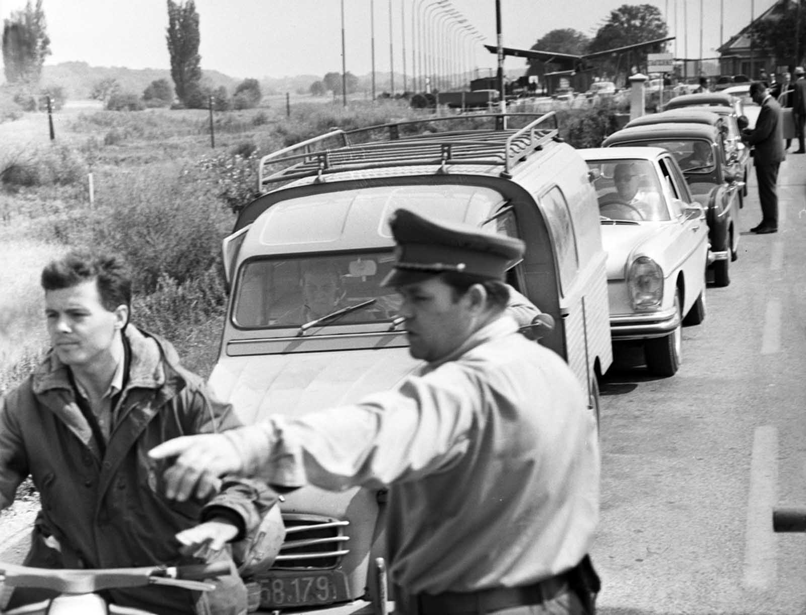 Czechoslovakian refugees flee the country, photographed here at the Austrian border, in autumn 1968.