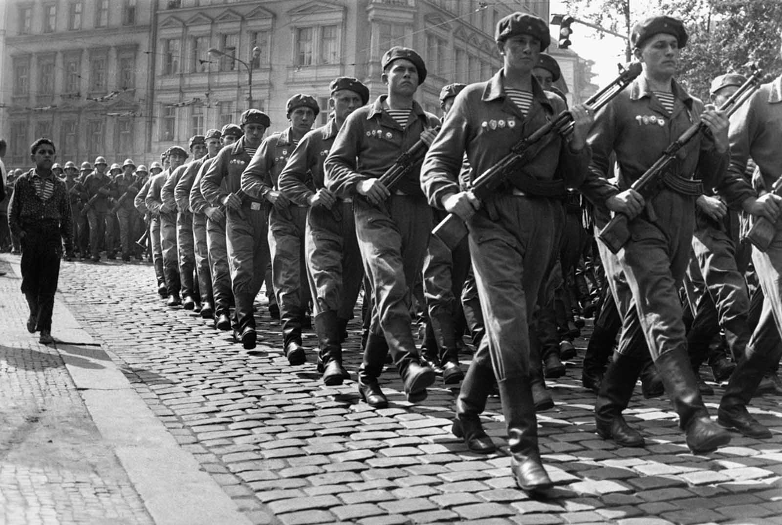 Soviet troops march through Prague in September 1968. After the invasion, a permanent Soviet presence was established in Czechoslovakia to prevent further reforms.