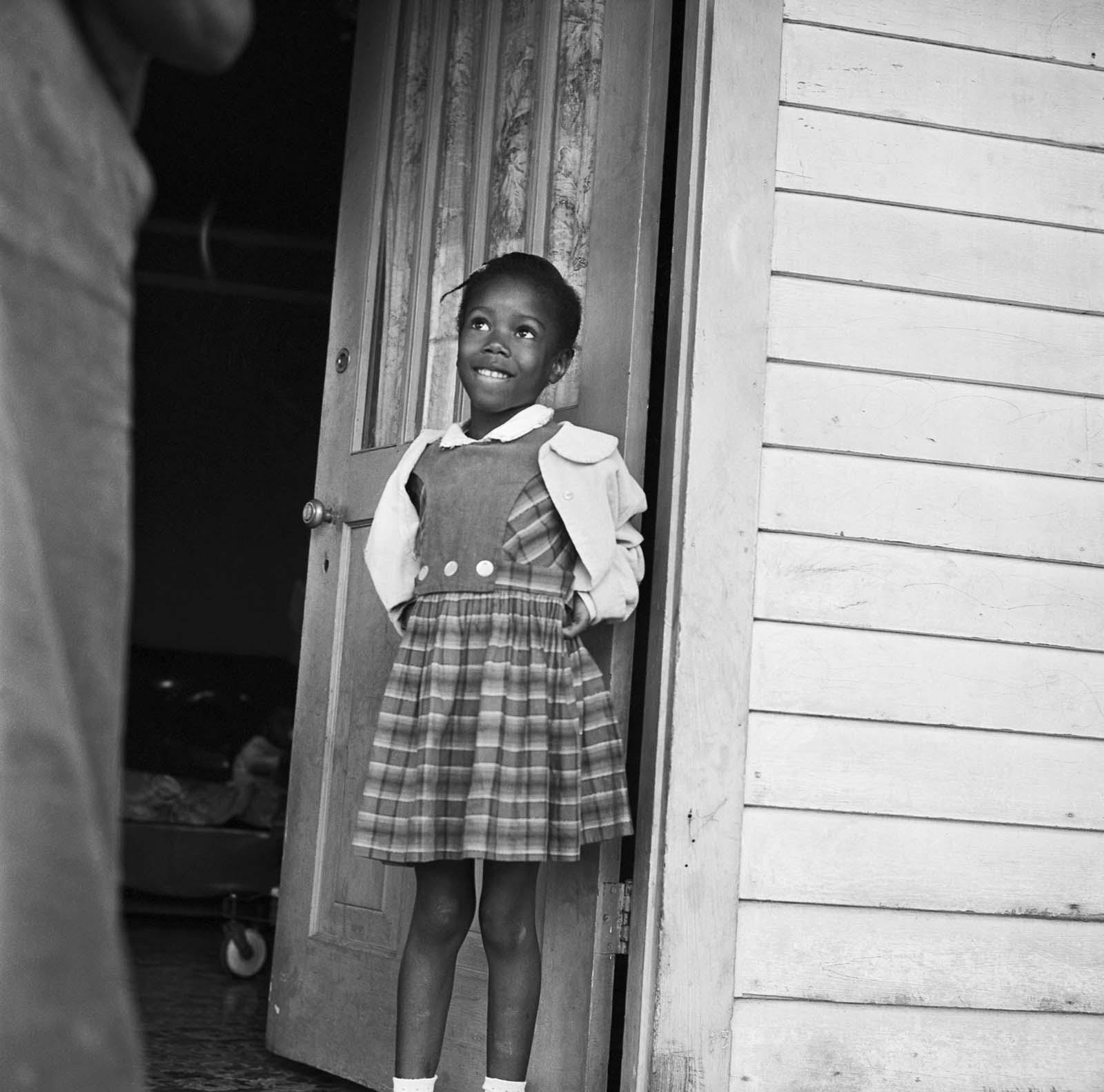 Ruby Nell Bridges at age 6, was the first African American child to attend William Franz Elementary School in New Orleans after Federal courts ordered the desegregation of public schools.