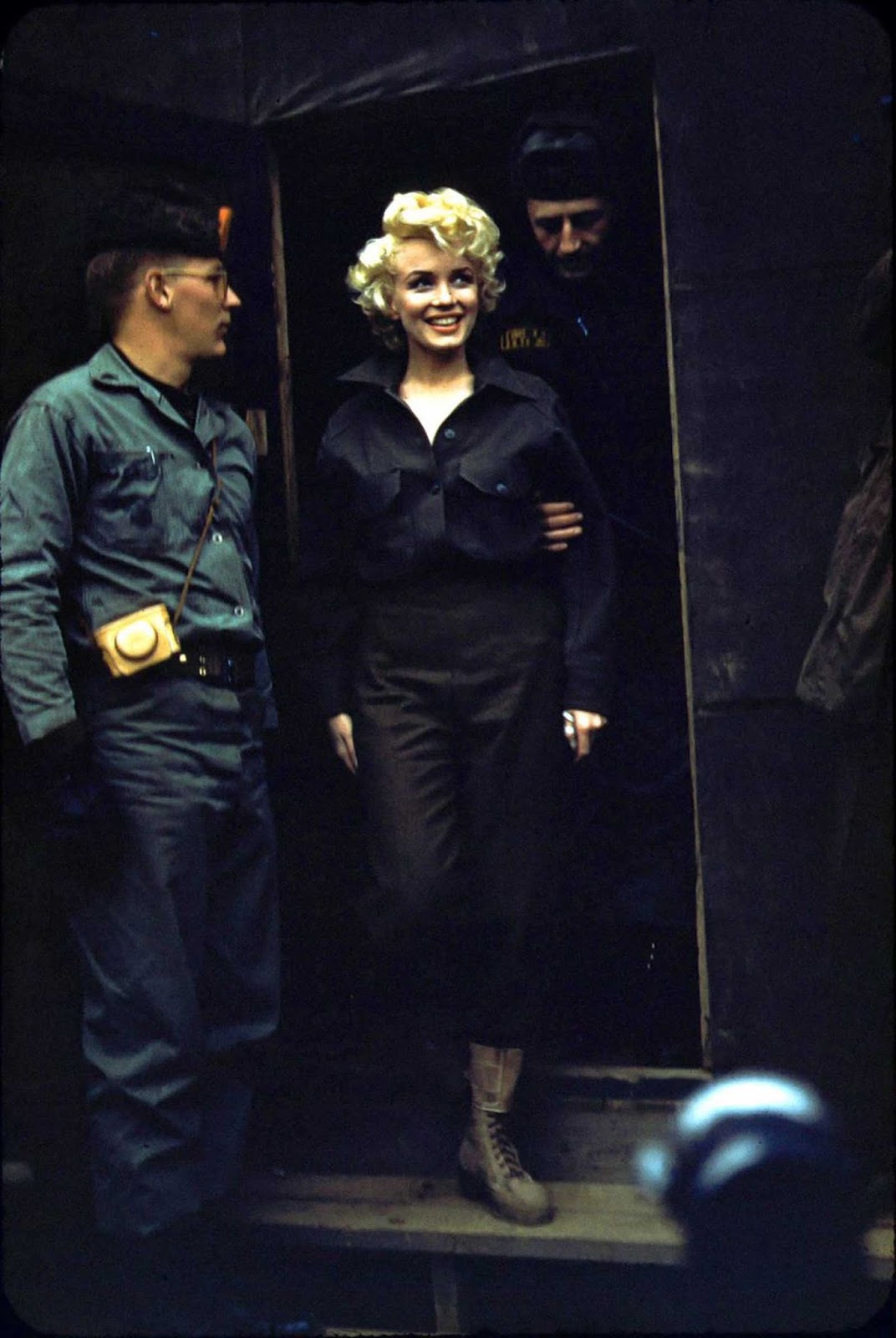 She looks amazing in her baggy army uniform.