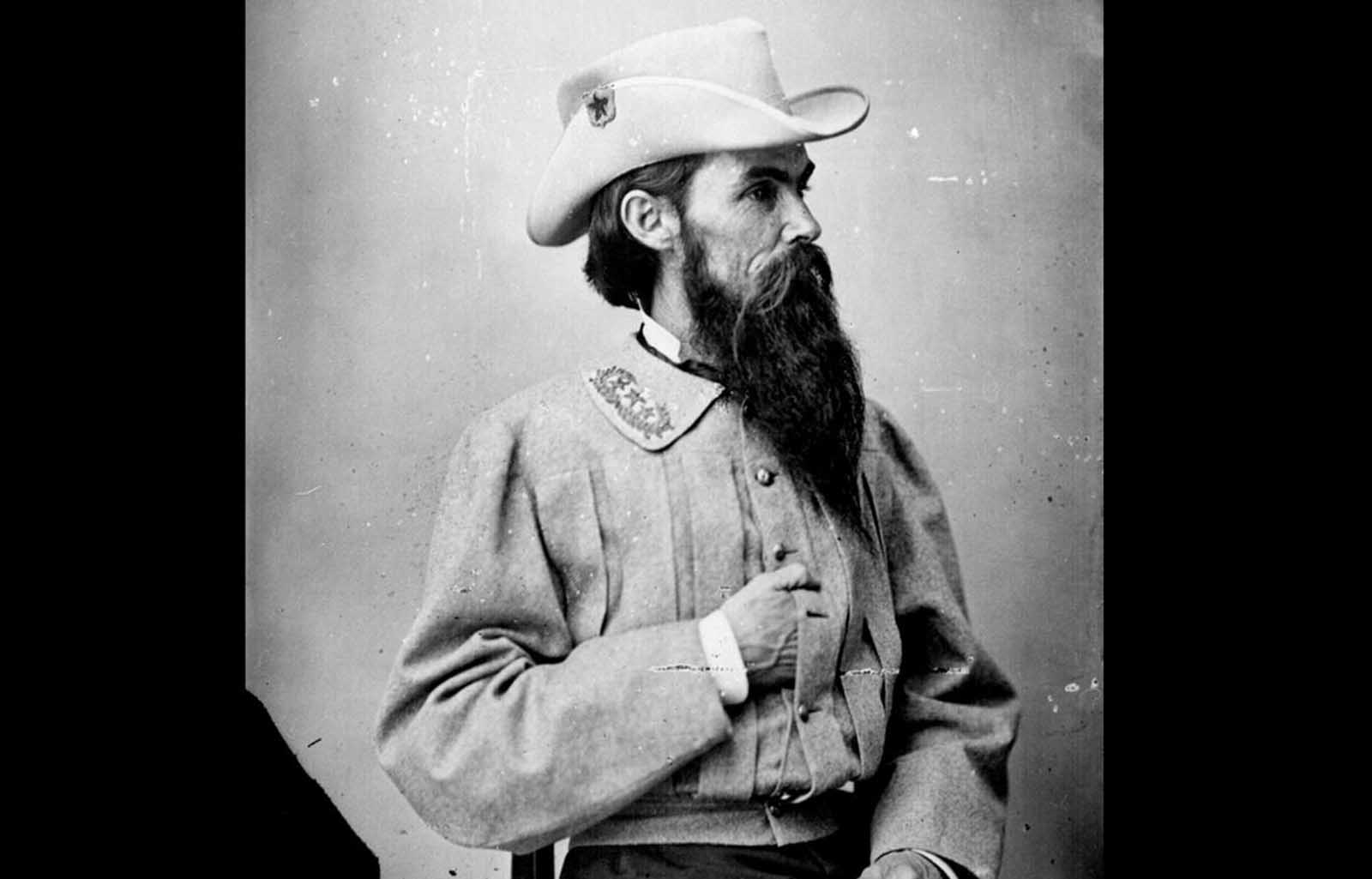 William Mahone was a civil engineer, railroad executive, and ardent supporter of the secession of the South. In 1861, after Virginia seceded, Mahone -- still a civilian -- orchestrated the capture of the Gosport Shipyard in in Portsmouth, Virginia, driving an empty passenger train loudly into town, bluffing the Federal troops into abandoning the shipyard. He later took a commission as a colonel in the Confederate Army. After the war, Mahone served a term as the U.S. Senator from Virginia, in 1881.