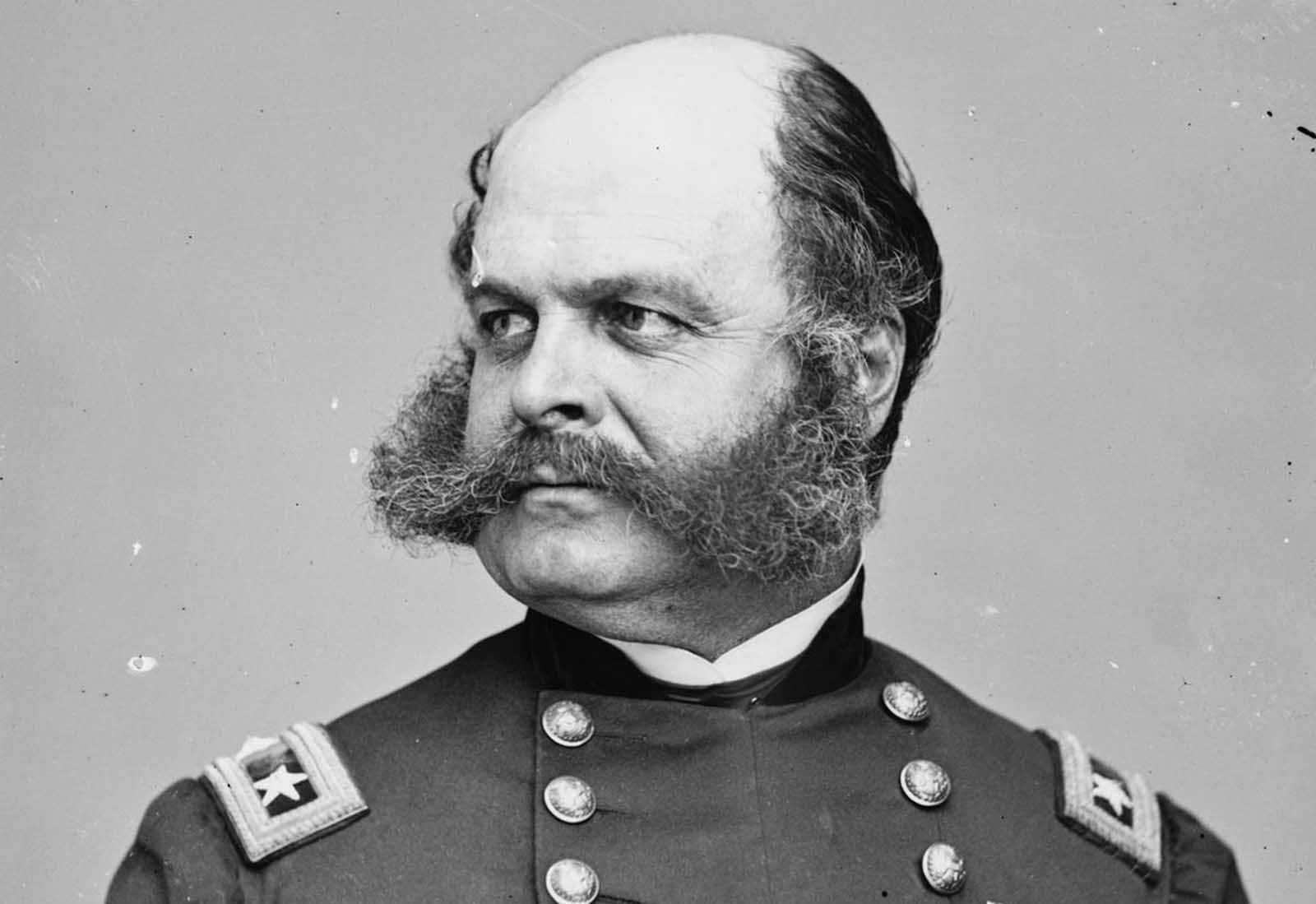 Union Major General Ambrose E. Burnside, conducted campaigns in North Carolina and Tennessee during the war. Afterwards he served as the Governor, and later as U.S. Senator from Rhode Island. His distinctive style of facial hair is now known as sideburns, derived from his last name.