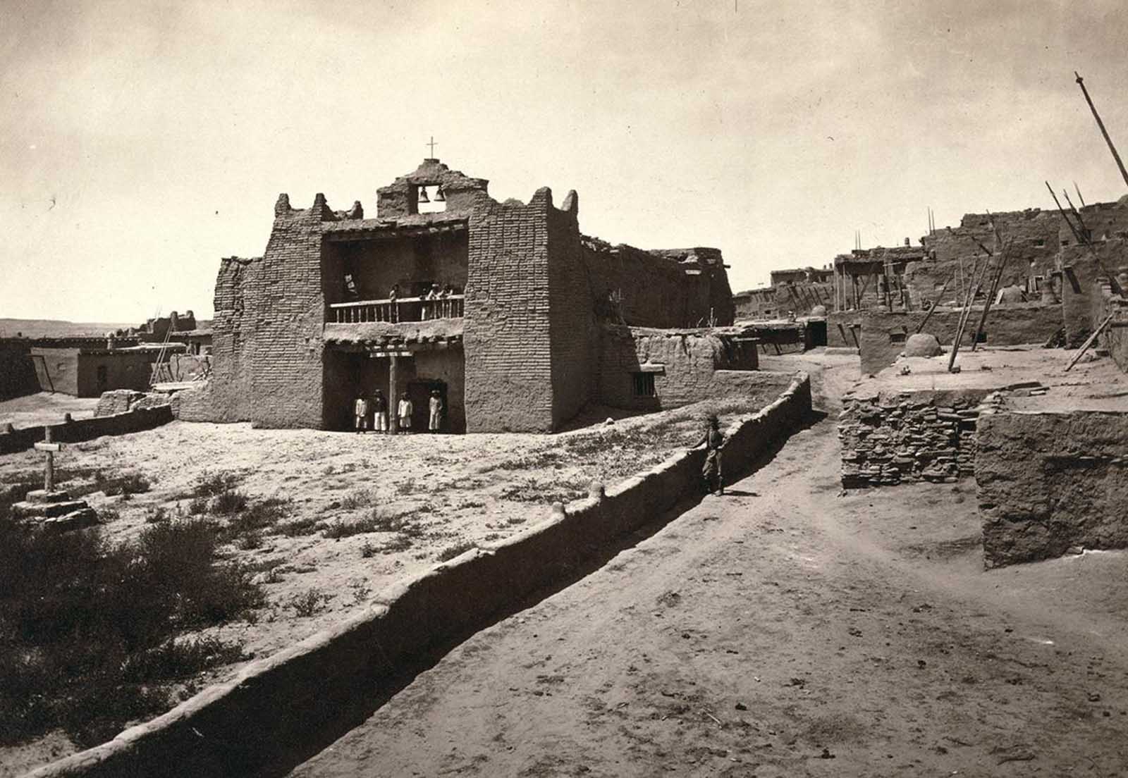Old Mission Church, Zuni Pueblo, New Mexico. View from the plaza in 1873.