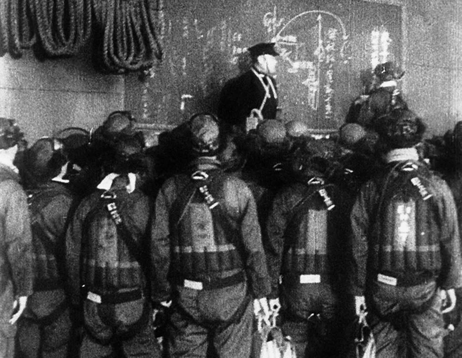 Japanese pilots get instructions aboard an aircraft carrier before the attack on Pearl Harbor, in this scene from a Japanese newsreel. It was obtained by the U.S. War Department and released to U.S. newsreels.