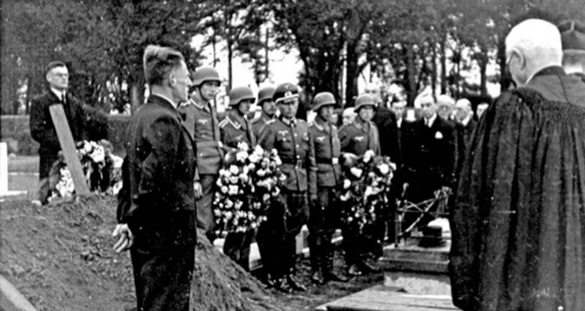 Hundreds of people lined the route but the Luftwaffe prevented them entering the gates of the cemetery.
