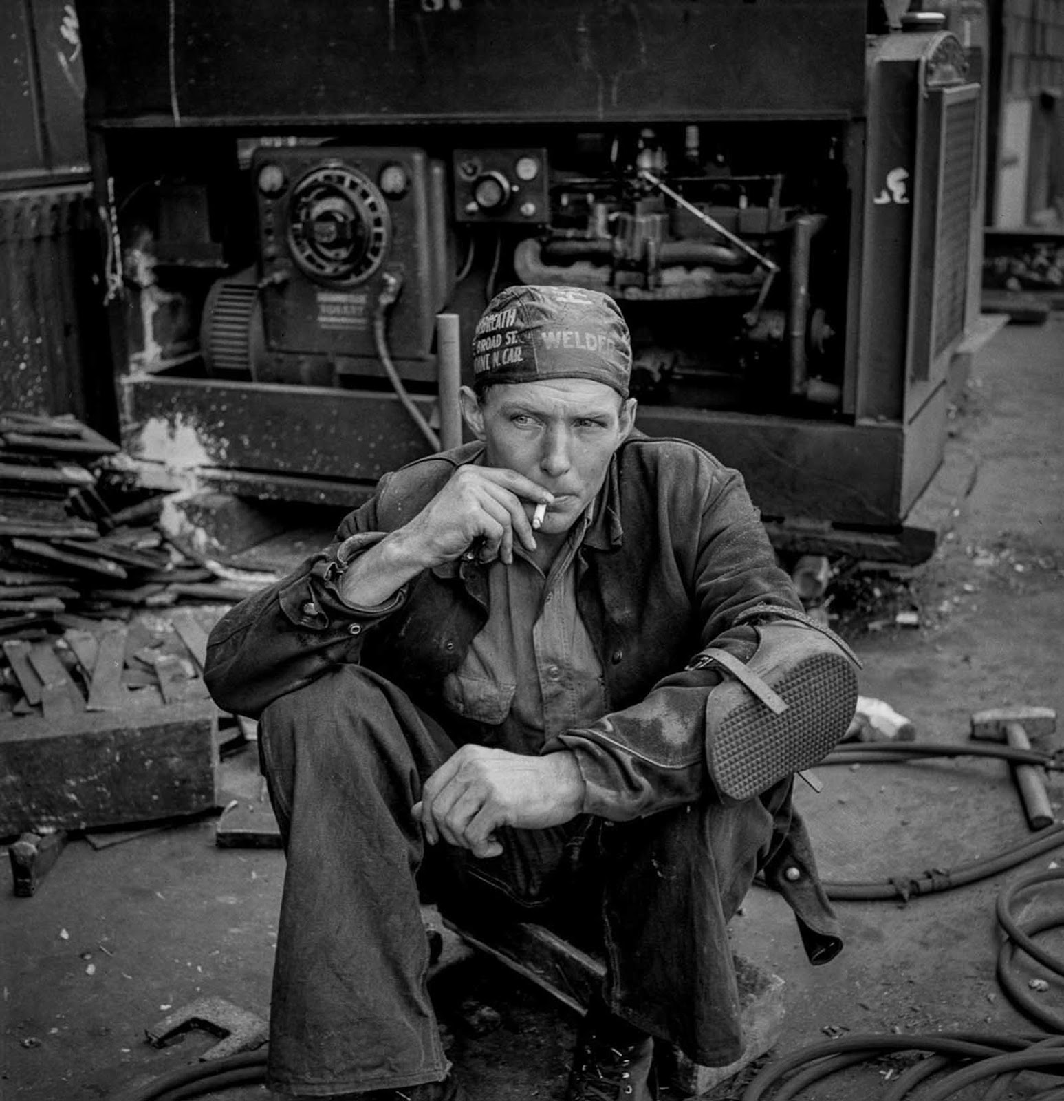A welder rests during his lunch hour.