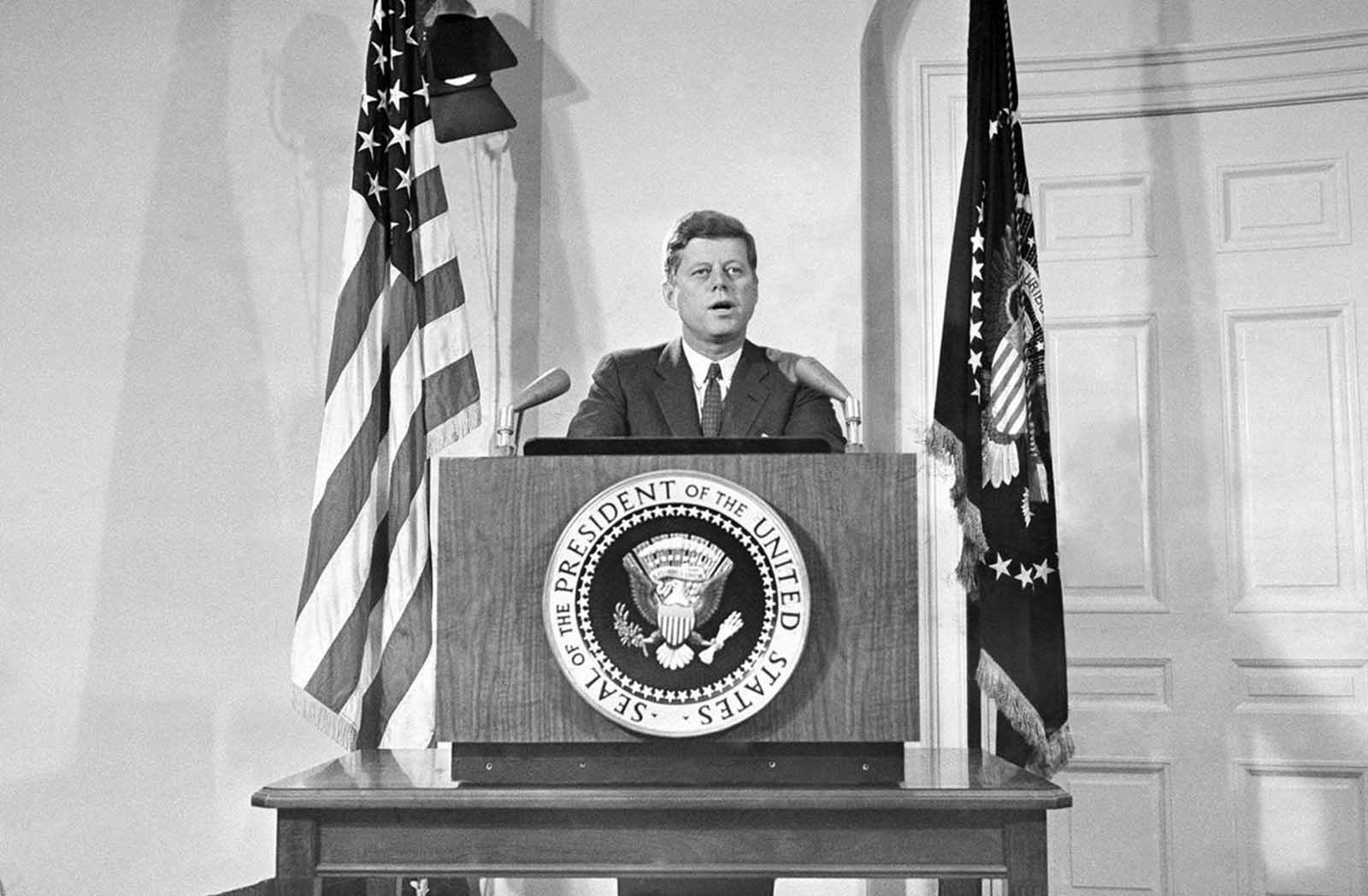 President John Kennedy reports personally to the nation on the status of the Cuban crisis, telling the American people that Soviet missile bases in Cuba are