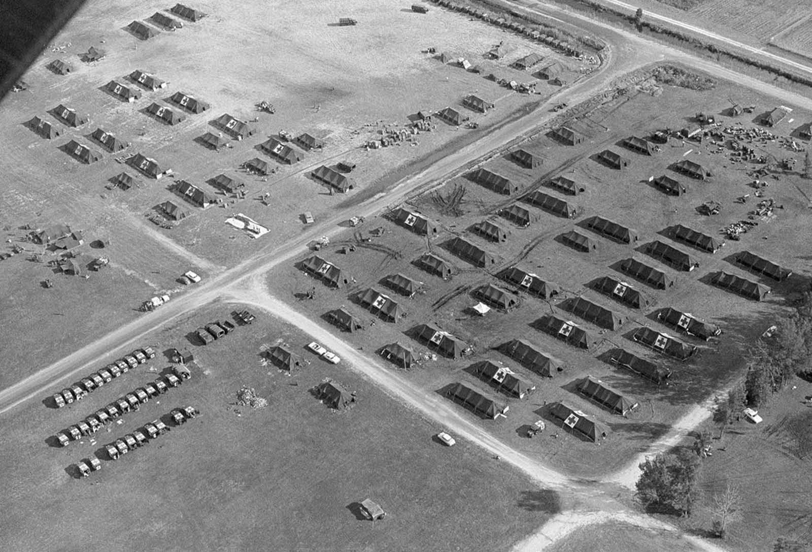 A group of U.S. Army hospital tents and ambulances, set up at the Opa Locka airport, formerly a marine air station in Miami, Florida in November of 1962.