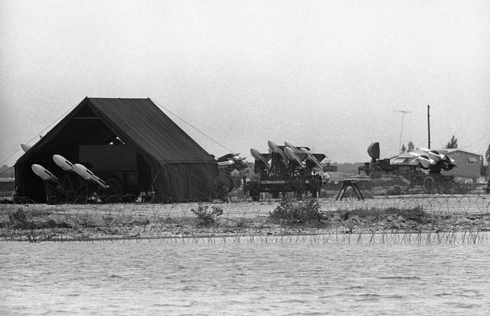 Buildup of troops and military equipment, rushed to south Florida to launch an invasion of Cuba if it had been ordered, remained on the keys, between Miami and Key West. This unit, showing no sign of dismantling, was manned and ready with its anti-aircraft missiles in Key West on November 21, 1962.