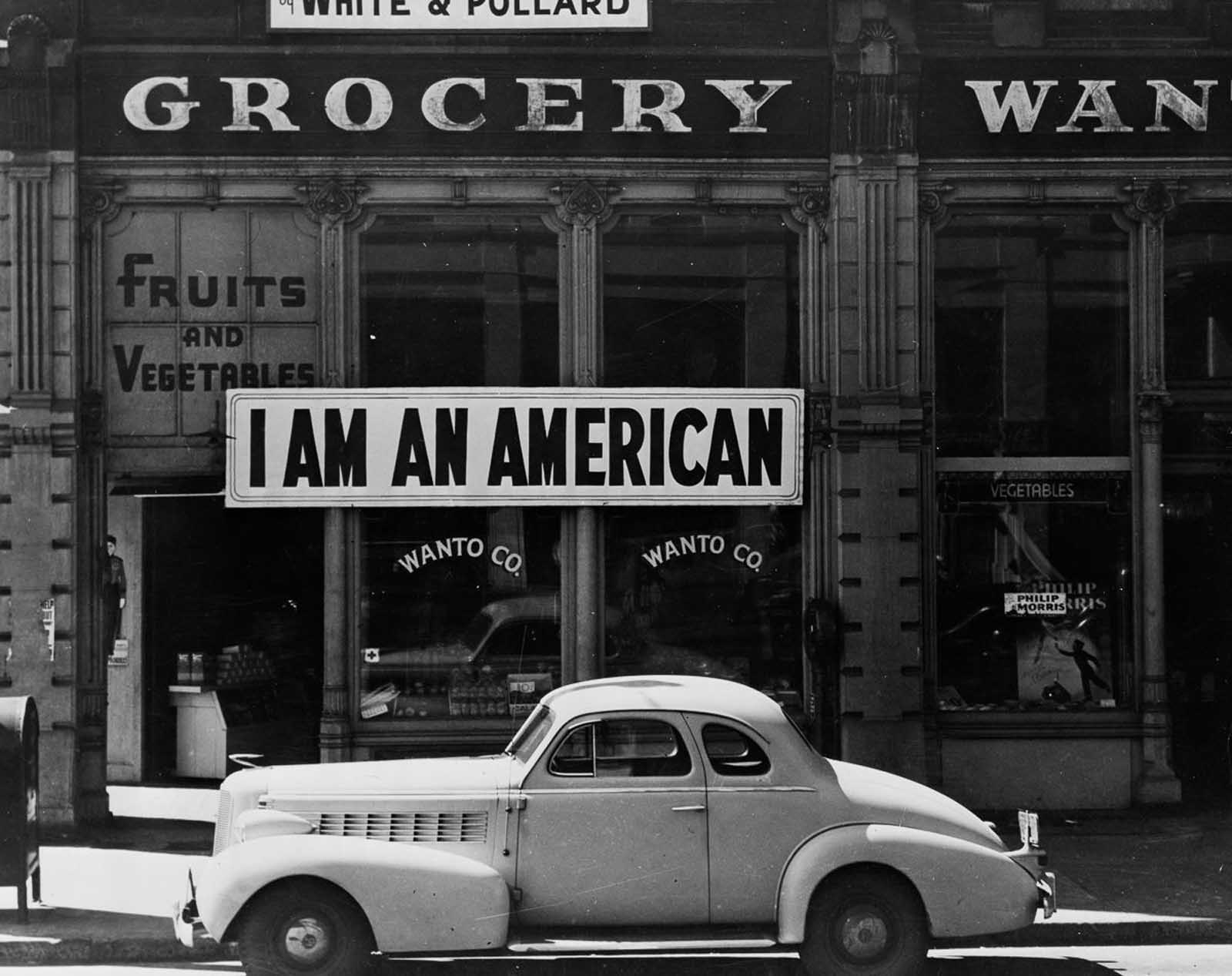 This store owned by a man of Japanese ancestry is closed following evacuation orders in Oakland, California, in April of 1942. After the attack on Pearl Harbor the owner had placed the