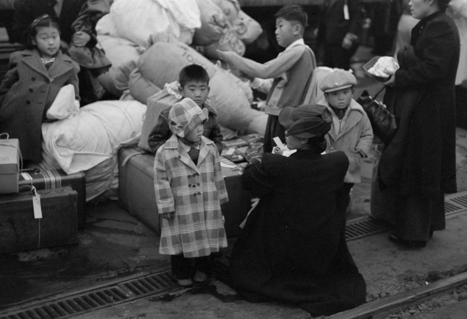 Japanese families waiting to be relocated.