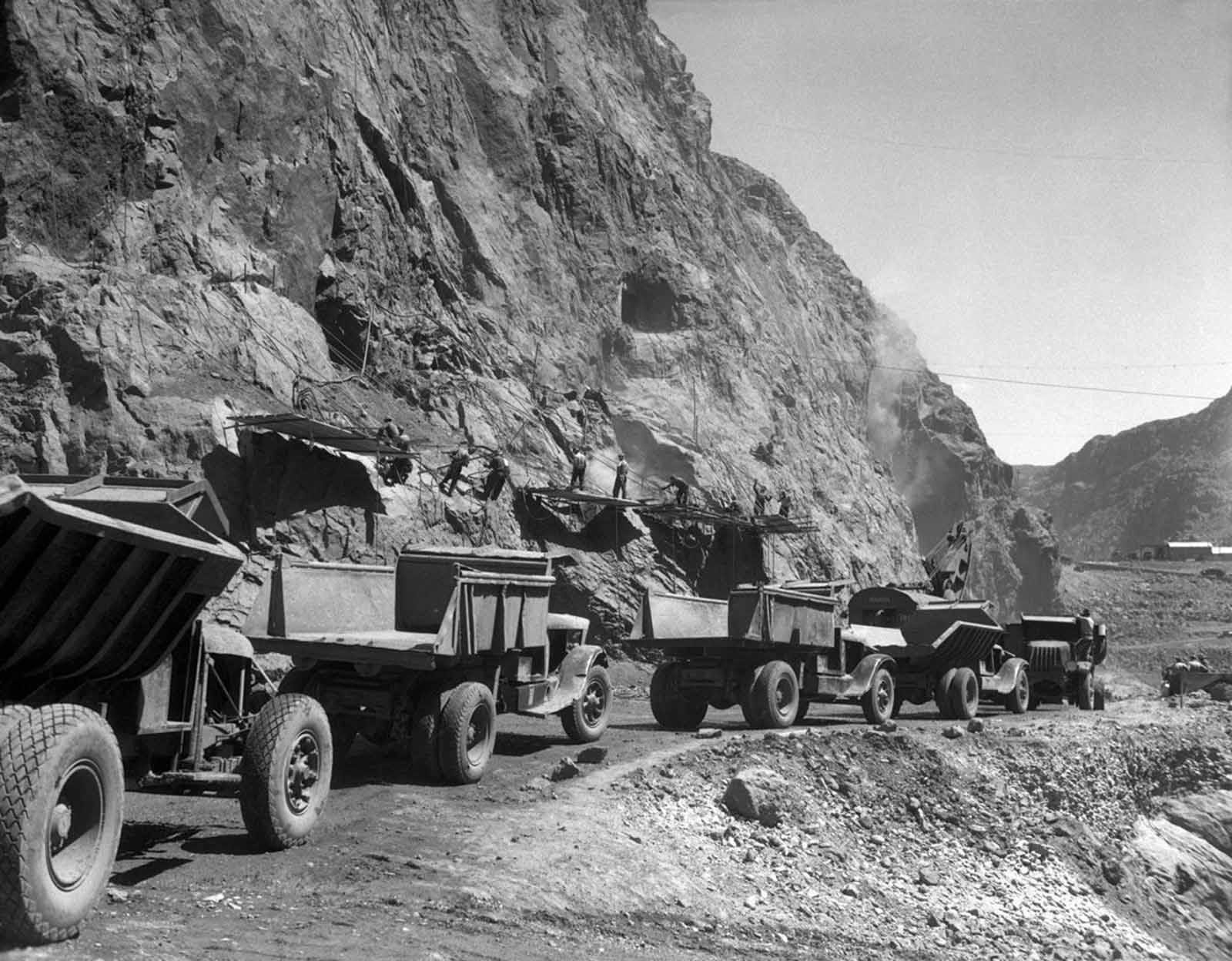 To protect the construction site from the Colorado River and to facilitate the river's diversion, two cofferdams were constructed. Work on the upper cofferdam began in September 1932, even though the river had not yet been diverted.