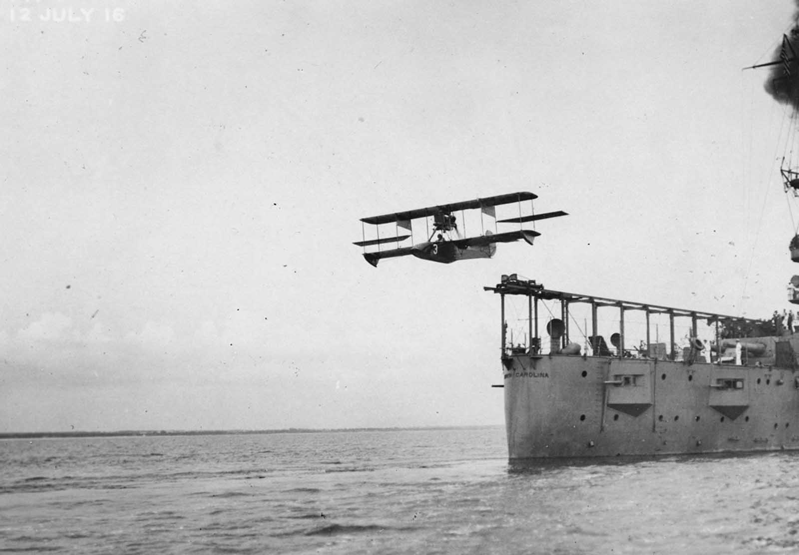 A Curtiss Model AB-2 airplane catapulted off the deck of the USS North Carolina on July 12, 1916. The first time an aircraft was ever launched by catapult from a warship while underway was from the North Carolina on November 5, 1915. 