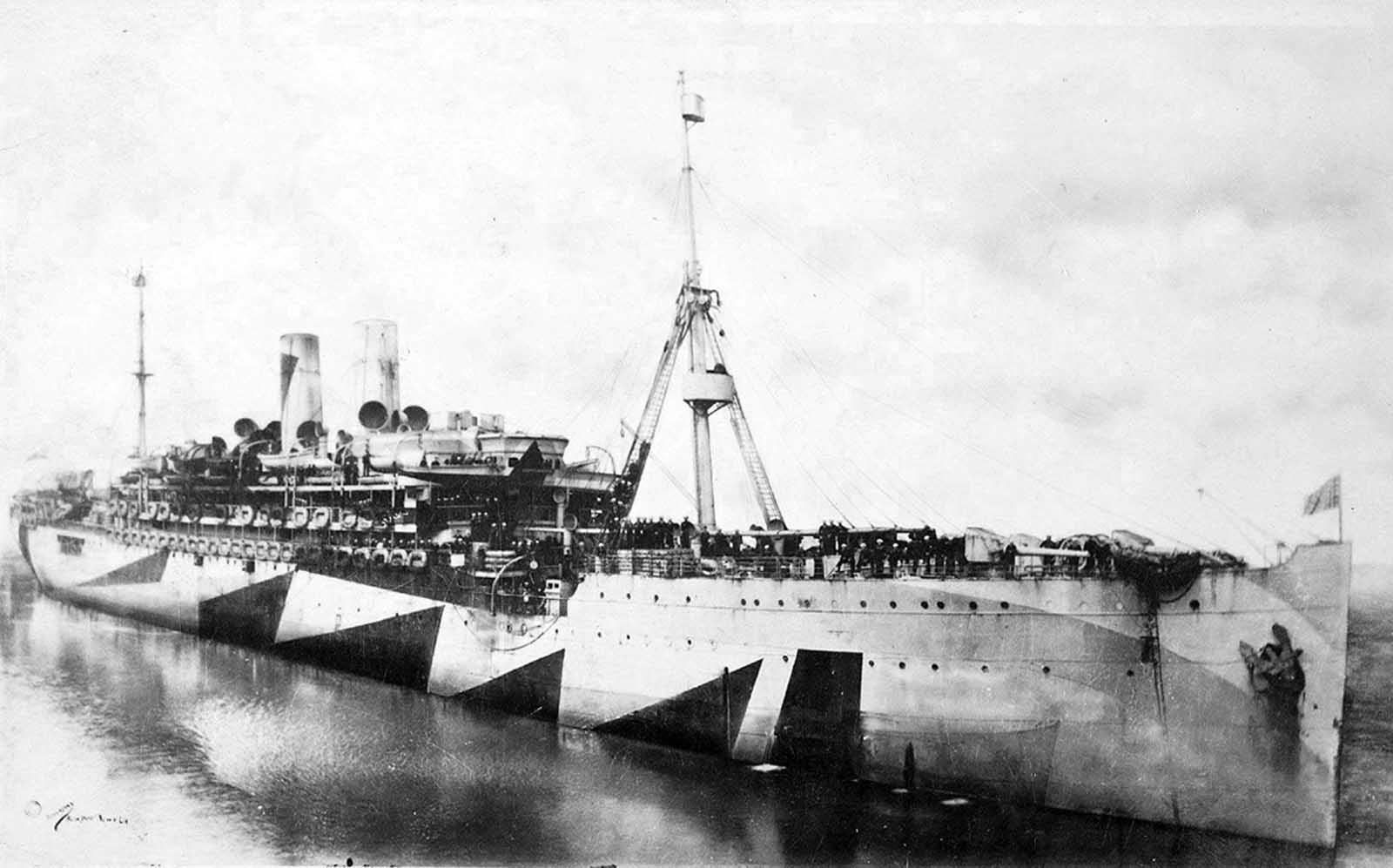The USS Pocahontas, a U.S. Navy transport ship, photographed in Dazzle camouflage, in 1918. The ship was originally a German passenger liner named the Prinzess Irene. She was docked in New York at the start of the war, and seized by the U.S. when it entered the conflict in April 1917, and re-christened Pocahontas.