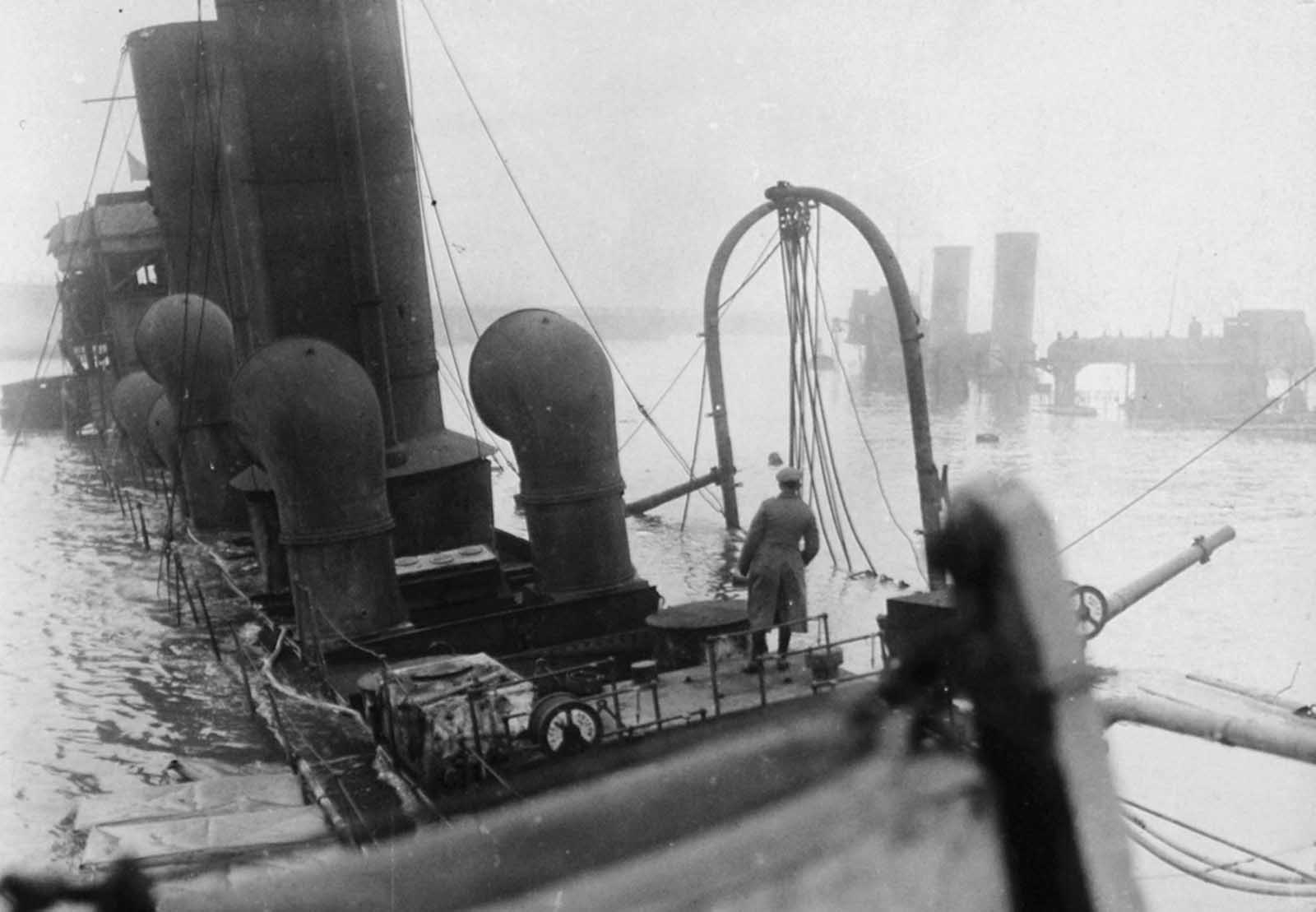The Zeebrugge Raid took place on April 23, 1918. The Royal Navy attempted to block the Belgian port of Bruges-Zeebrugge by sinking older ships in the canal entrance, to prevent German vessels from leaving port. Two ships were successfully sunk in the canal, at the cost of 583 lives. Unfortunately, the ships were sunk in the wrong place, and the canal was re-opened in days. Photograph taken in May of 1918.
