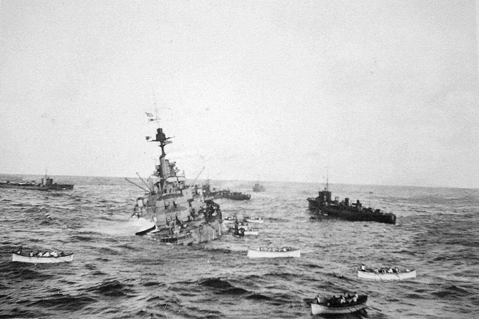 HMS Audacious crew board lifeboats to be taken aboard RMS Olympic, October, 1914. The Audacious was a British battleship, sunk by a German naval mine off the northern coast of Donegal, Ireland.