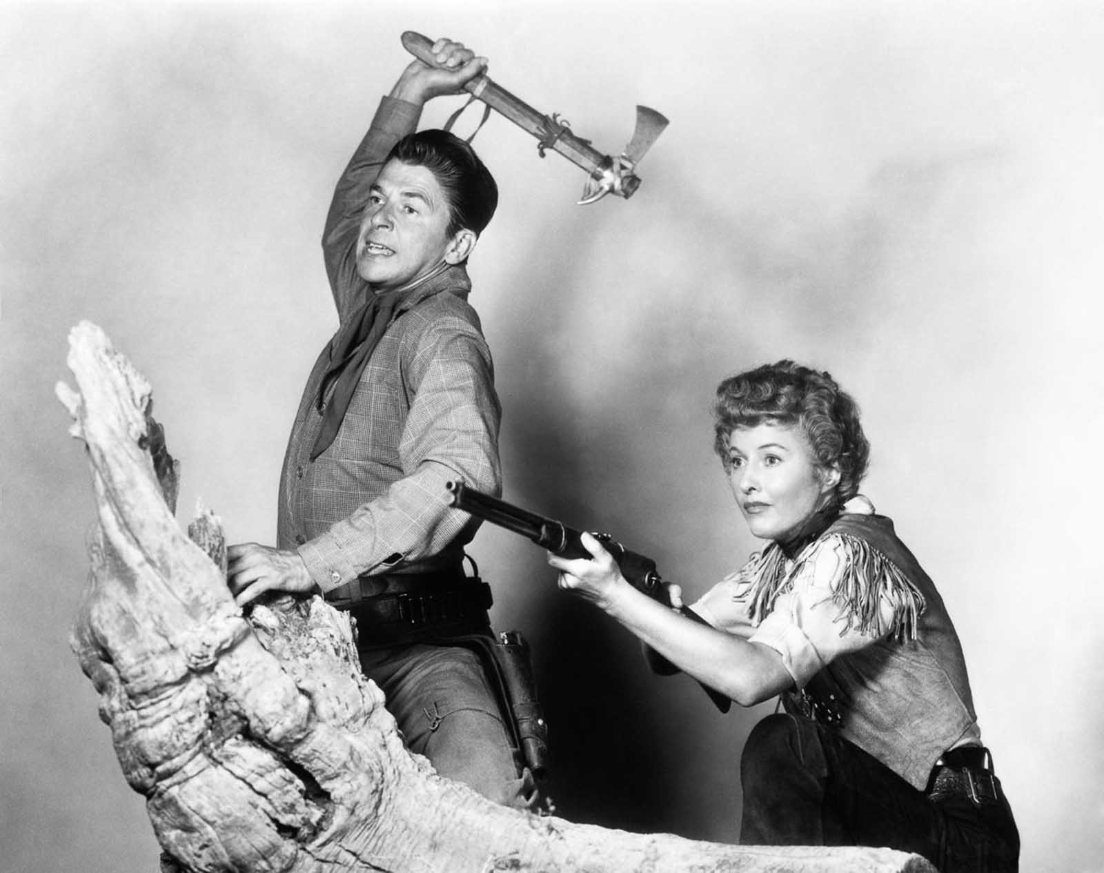 Ronald Reagan and Barbara Stanwyck in a publicity still for Cattle Queen of Montana.
