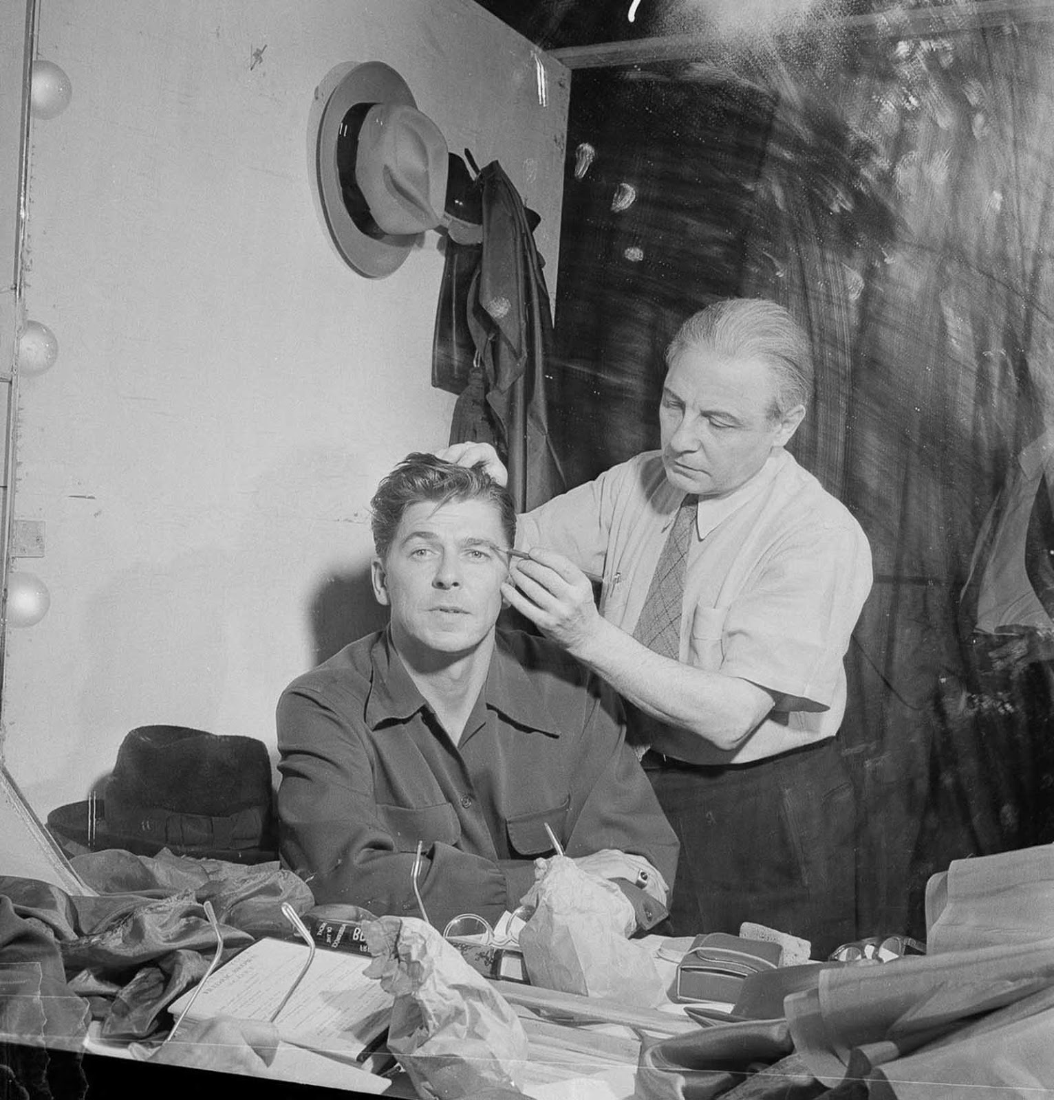 Reagan gets made up for an appearance on an episode of Nash Airflyte Theatre. 1950.