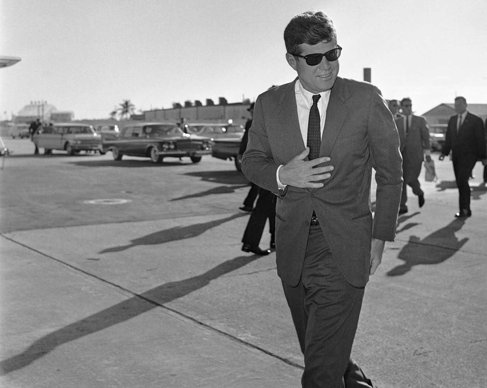 President John F. Kennedy heads for Washington after an overnight stopover on December 18, 1961 in West Palm Beach, Florida where he rested after his Latin American tour due to a heavy cold.