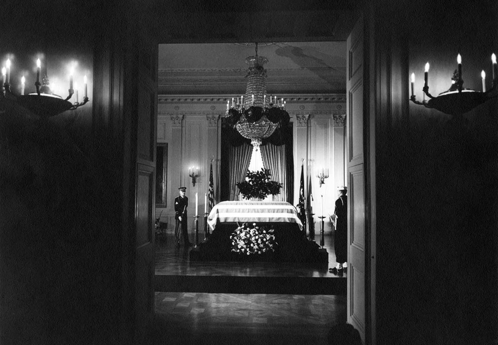 Kennedy's casket lying in state in the East Room of the White house, before it was moved to the Capitol Rotunda.