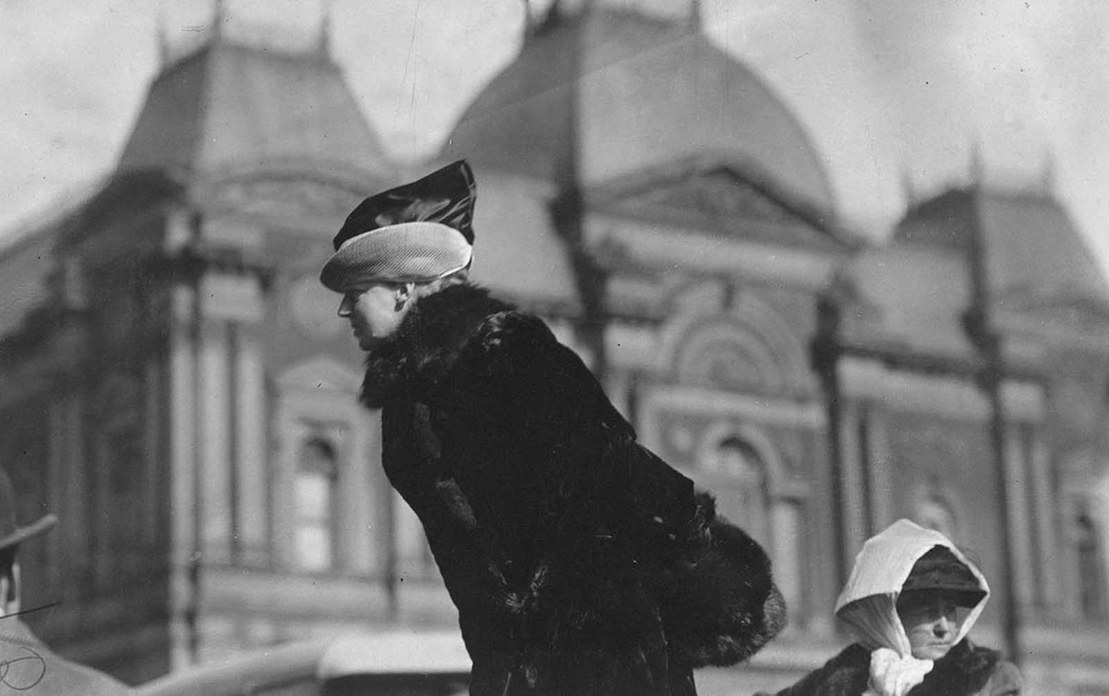 At an open air meeting in Washington, District of Columbia, in March of 1913, calling upon Congress to pass the national woman suffrage amendment. This photograph shows Mrs. John Rogers, sister-in-law of former Secretary of War, and a member of the Advisory Council of the Congressional Union for Women Suffrage, speaking in front of old Corcoran Art Gallery.