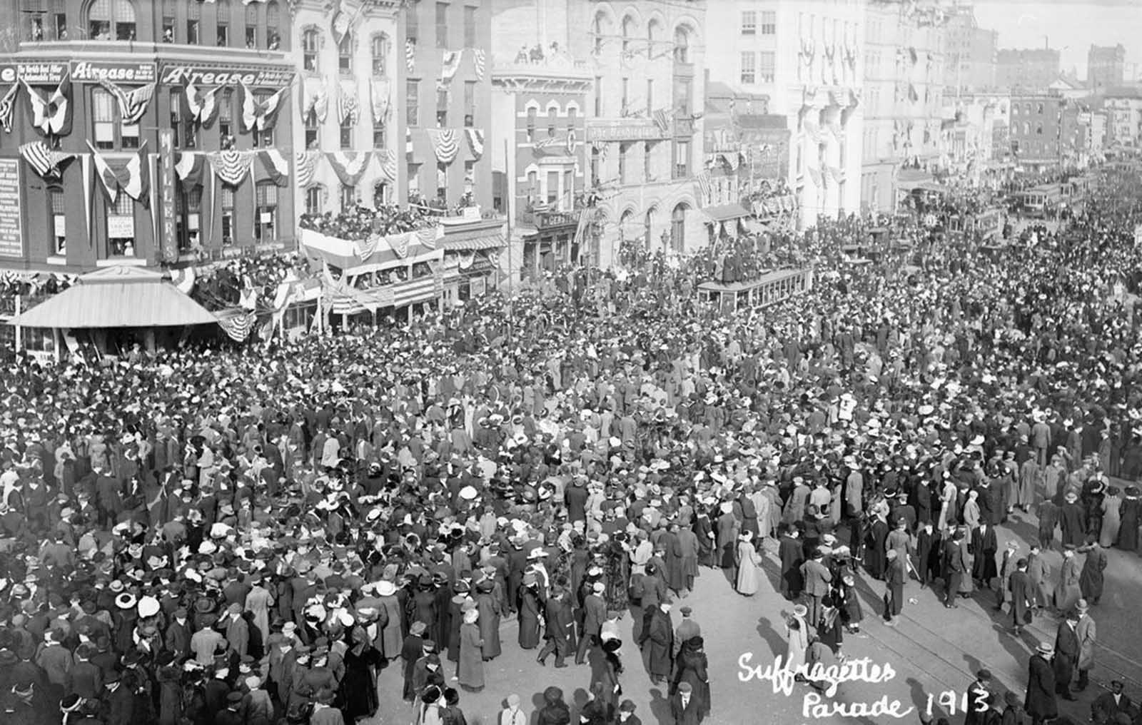 Crowds press in on the parade route in Washington, District of Columbia, on March 3, 1913. The stands and bunting were in place for the Inauguration of President Woodrow Wilson, scheduled for the following day.