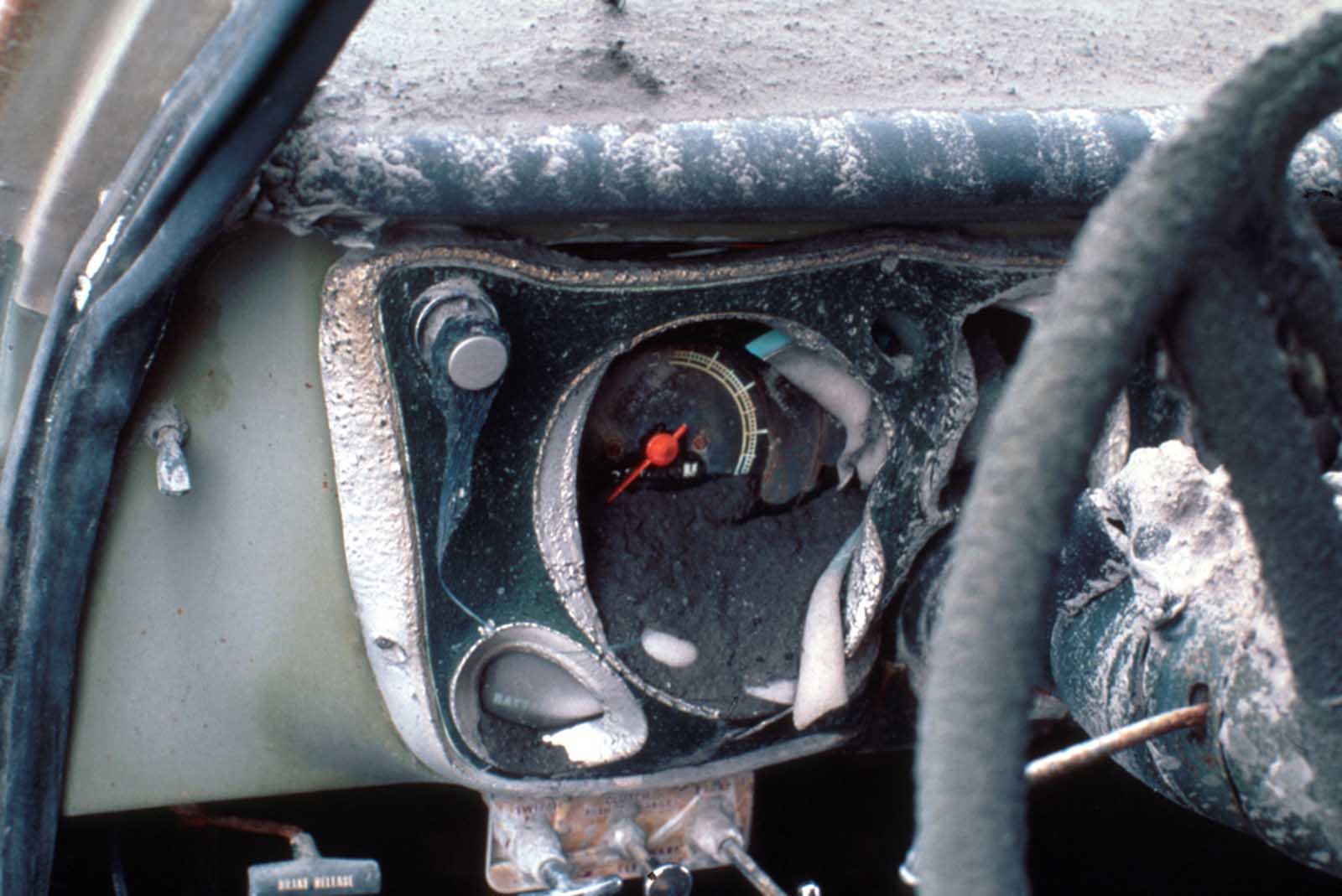 The melted dashboard of pickup truck located on ridge top about 14 km north of Mount St. Helens, in Skamania County, Washington, on June 18, 1980.