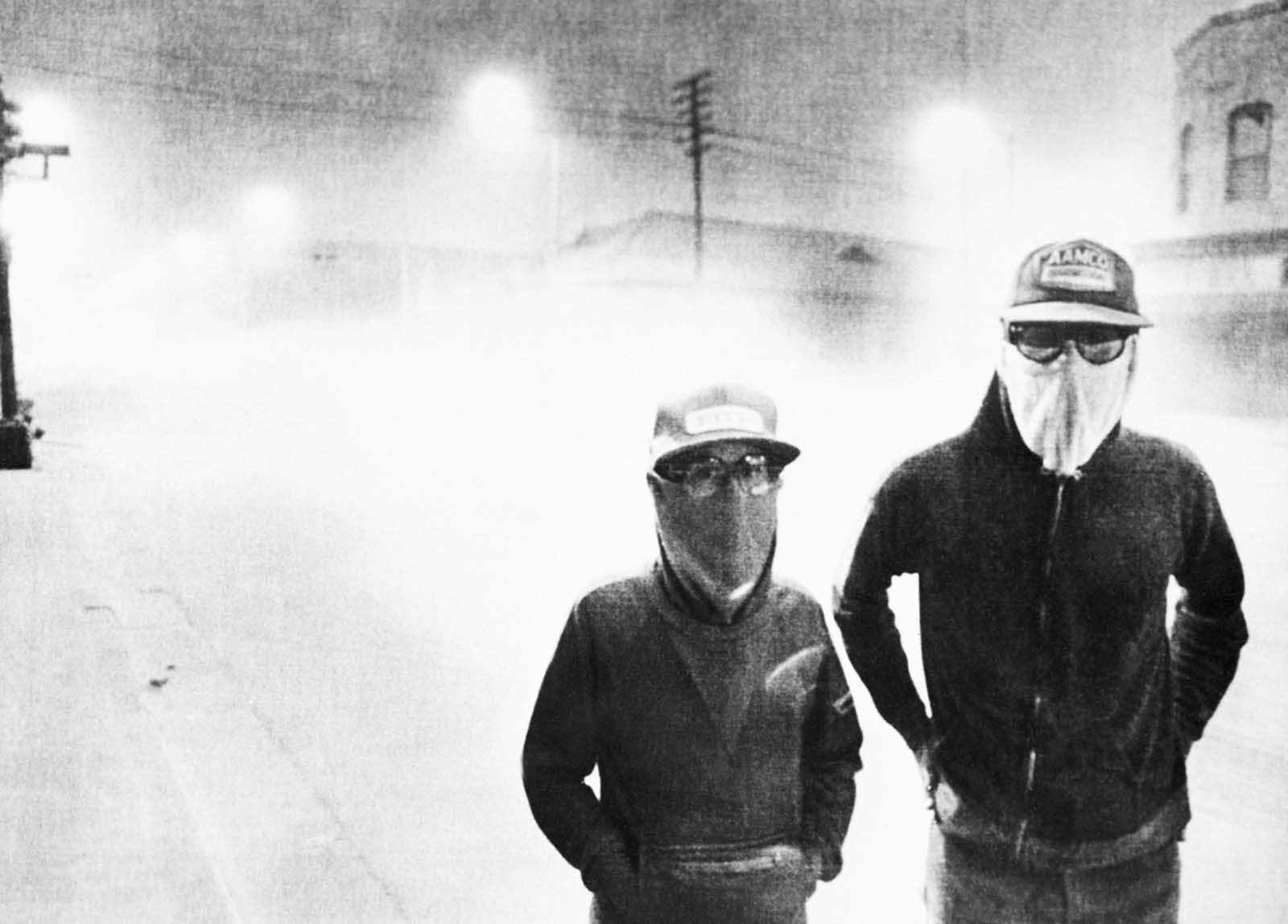 The streets of Yakima, Washington, are dark at 3:00 p.m. after an eruption of Mount St. Helens on May 18, 1980. Volcanic ash covered the streets as people wore masks to avoid breathing the particles.