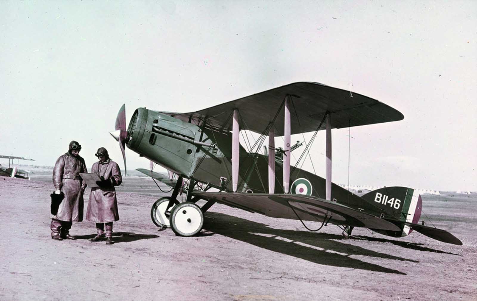 Captain Ross-Smith (left) and Observer in front of a Modern Bristol Fighter, 1st Squadron A.F.C. Palestine, February 1918. This image was taken using the Paget process, an early experiment in color photography.