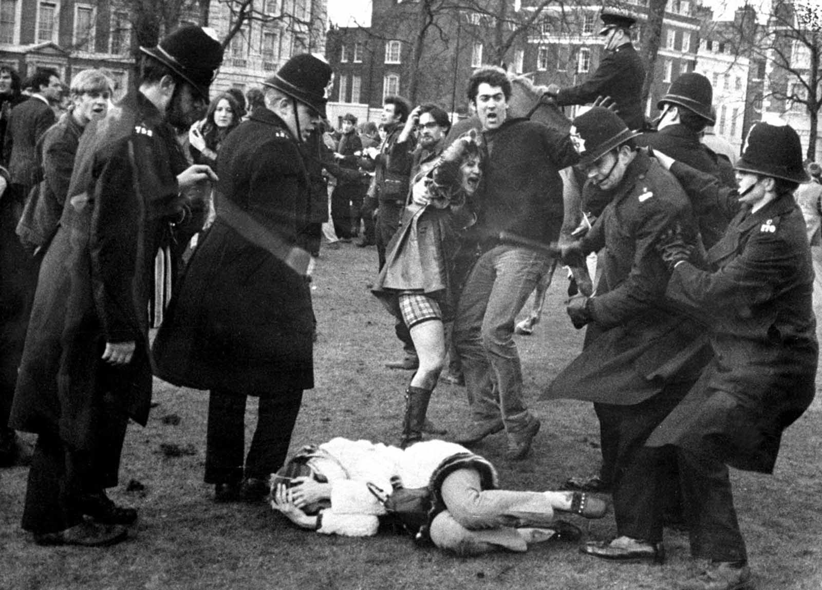 Police struggle with anti-Vietnam War demonstrators outside the Embassy of the United States in Grosvenor Square, London, on March 17, 1968.