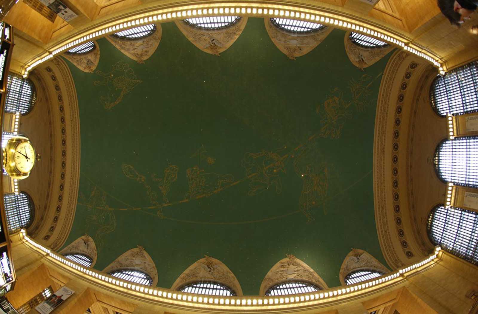 The 59 stars shine as part of the backwards-painted zodiac set in gold leaf constellations span the ceiling of the main concourse of Grand Central Terminal in New York, January 25, 2013.