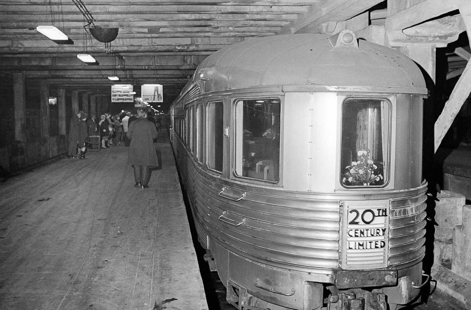The 20th Century Limited gets ready to leave Grand Central Station in New York for its last run, on December 2, 1967. The 20th Century Limited was an express passenger train that ran between between Grand Central Terminal and LaSalle Street Station in Chicago, operated by the New York Central Railroad from 1902 until 1967.