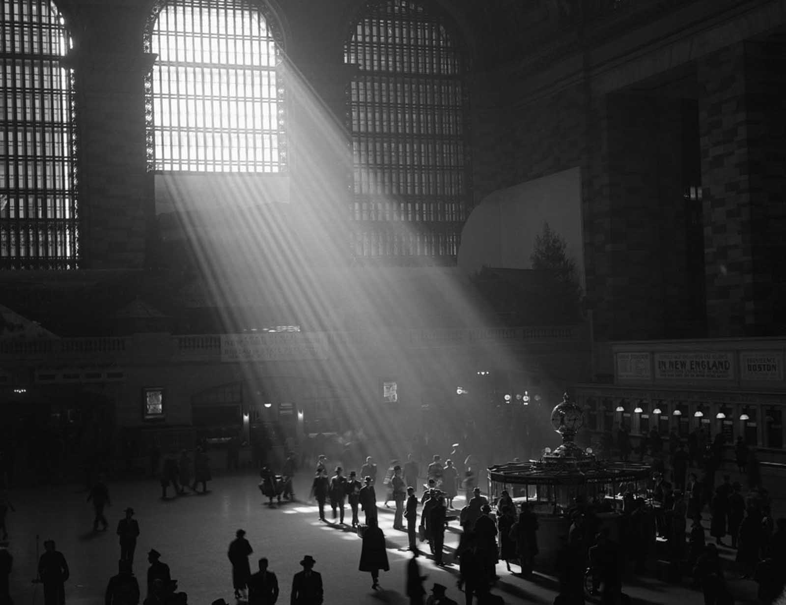 The interior of Grand Central Station, with the sun streaming in through the window.