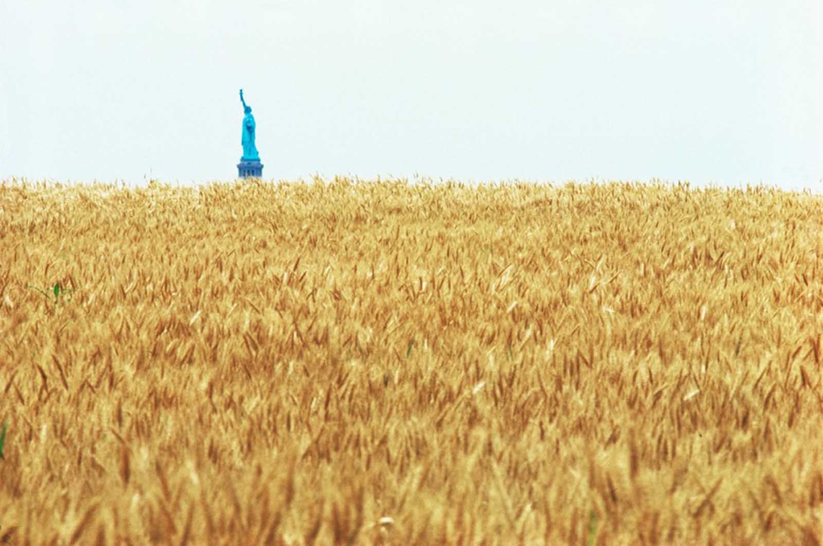 With the Statue of Liberty across the Hudson.