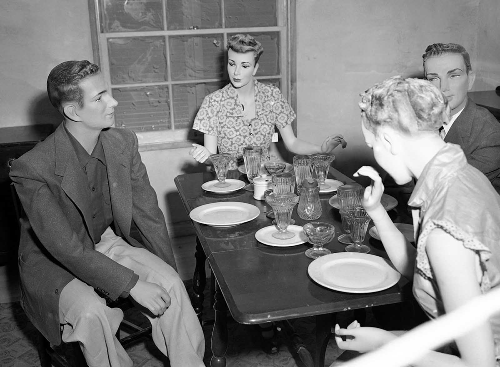 In Operation Doorstep, conducted during the larger Operation Upshot-Knothole nuclear bomb test, mannequins are seated at a table in the dining room of House No. 2, attending a “dinner party” thrown by Civil Defense officials who are testing the effects of an atomic explosion on houses and occupants on March 15, 1953.