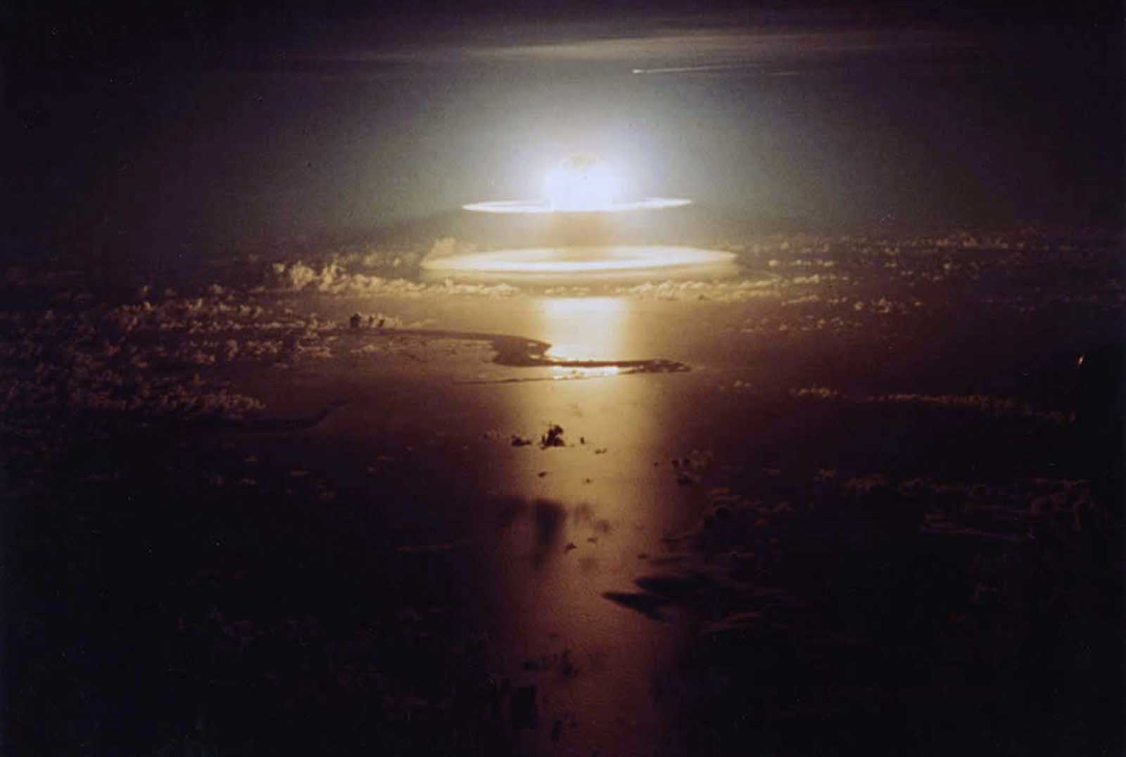 Expanding rings surround a mushroom cloud during the Yeso test explosion, part of Operation Dominic, a series of over 100 nuclear test explosions in Nevada and the Pacific in 1962.