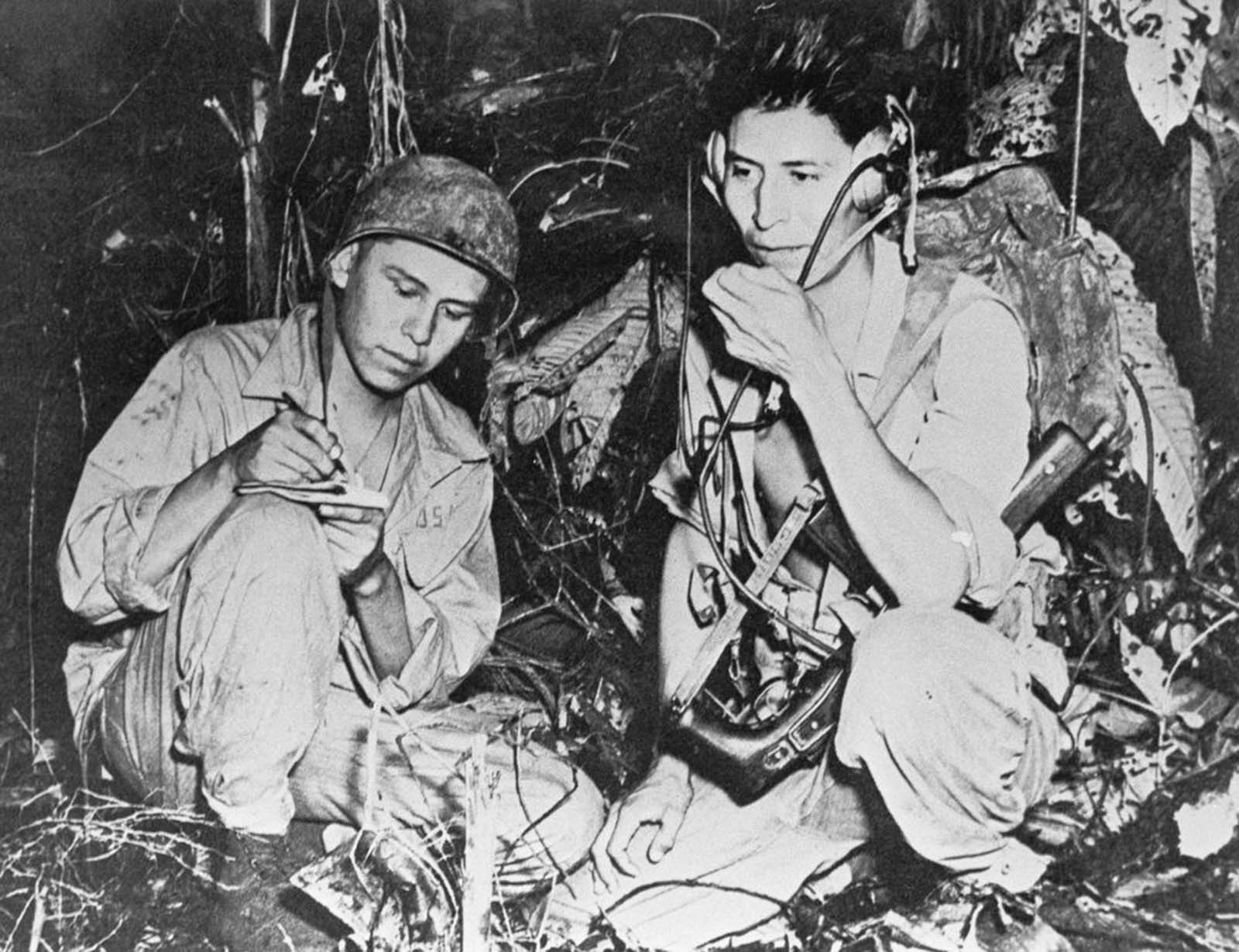 Code talkers transmit messages during the Battle of Bougainville. 1943.