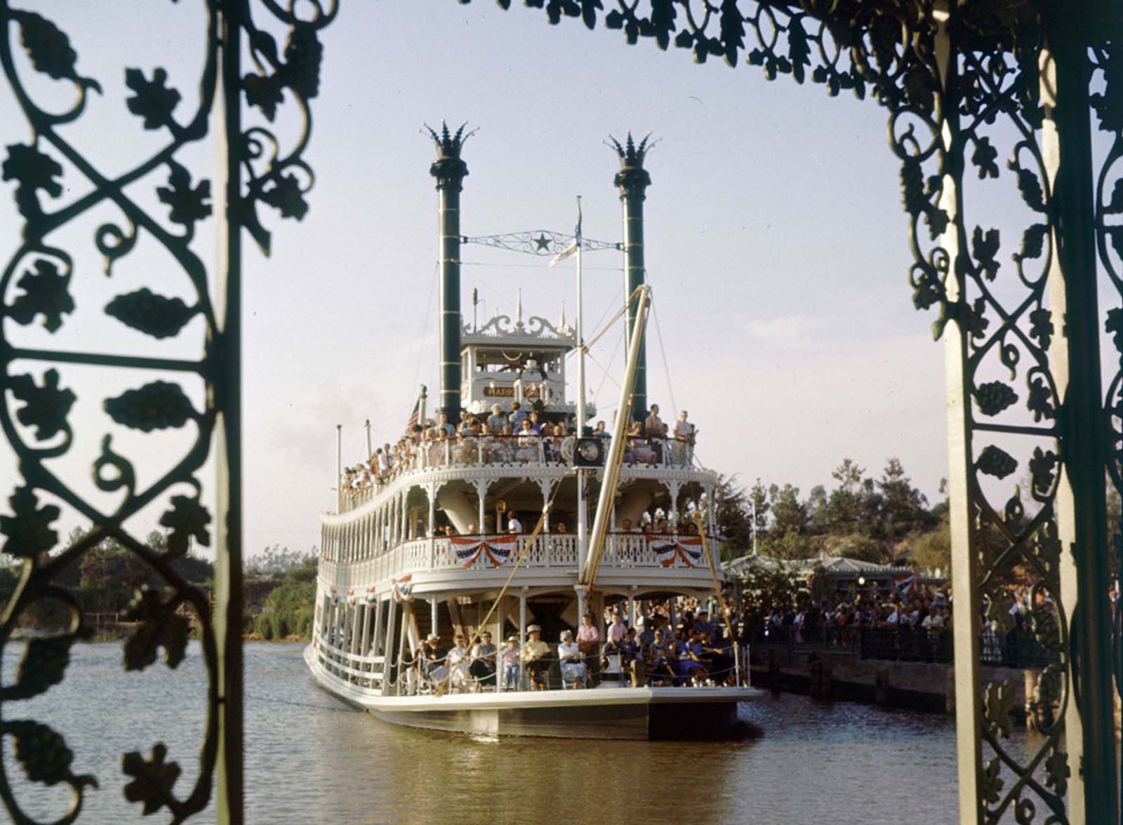 A crowded Mark Twain Riverboat sails at Disneyland in July 1955.