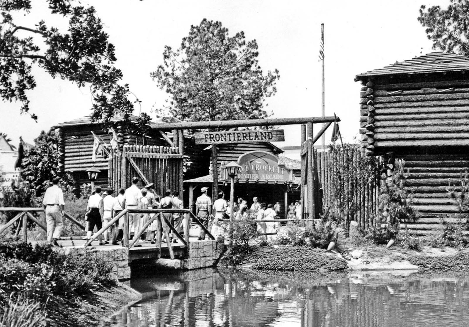 Tourists enter Frontierland, a re-creation of the Old West, in Disneyland, ca. 1955.