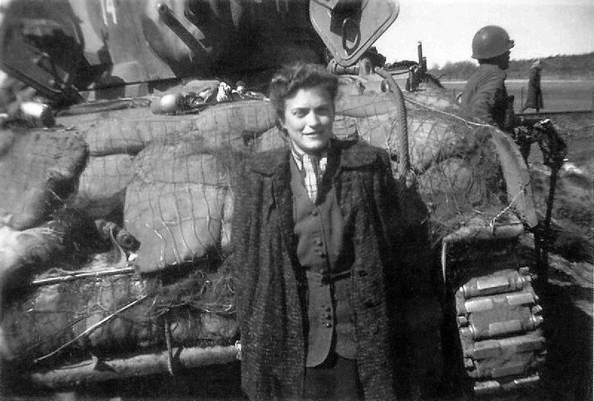 This is Gina Rappaport, who spoke very good English and spent a couple hours telling her story to the American troops. She was in the Warsaw ghetto under terrible conditions, and then was sent to Bergen-Belsen.