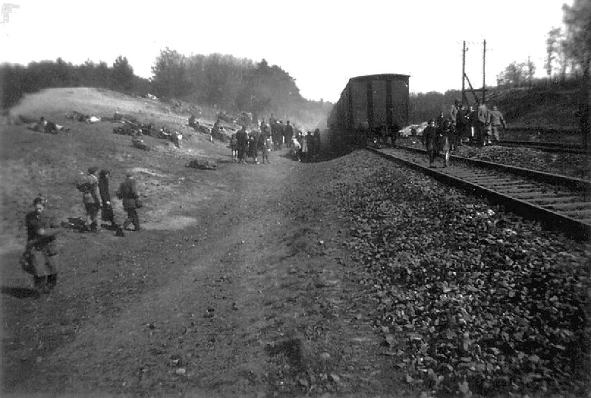 On the hill to the left are people resting - some forever. Some sixteen died of starvation before food could be brought to the train.