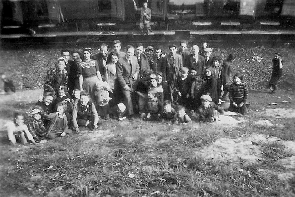 They were crammed into all available space and the freight cars were packed with about 60 – 70 people.