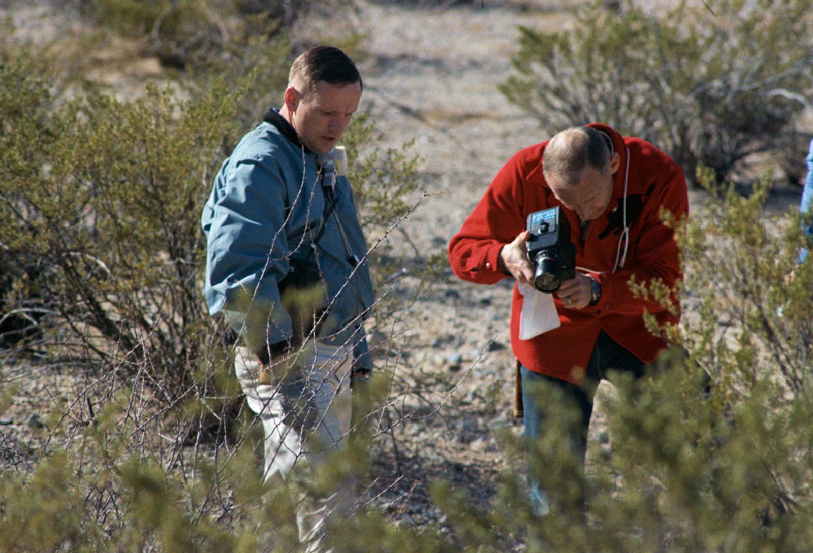 The astronauts Neil Armstrong and Buzz Aldrin take part in a geology field trip in Sierra Blanca, Texas.