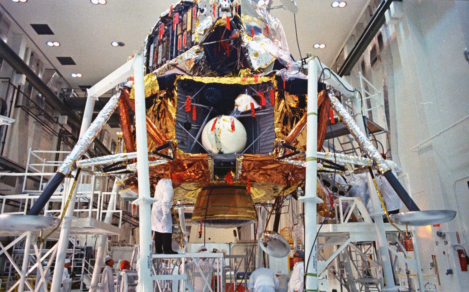 The final checkout of the Apollo 11 lunar module takes place on April 11, 1969, in the Open Bay Area of the Manned Spacecraft Operations Building at Kennedy Space Center.
