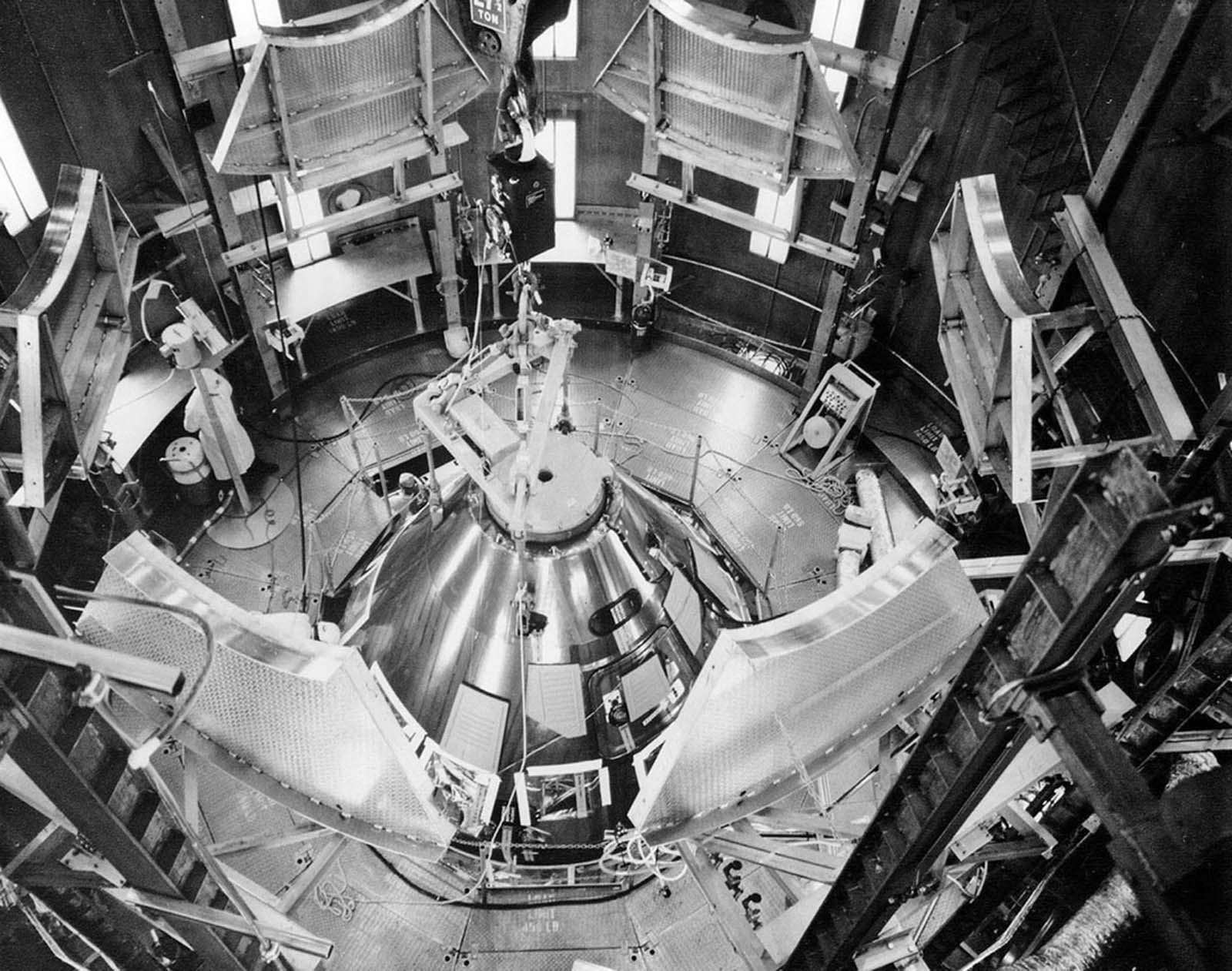 The command and service modules for Apollo 11 are installed in the altitude chamber of the Manned Spacecraft Operations Building at Kennedy Space Center.
